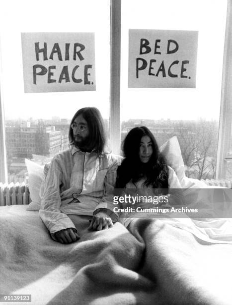 John Lennon and Yoko Ono at the 'bed-in' in the Presidential Suite of the Hilton hotel in the Netherlands, 26th March 1969.