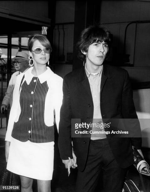 Photo of George HARRISON and Patti BOYD and BEATLES; of The Beatles, with his wife Patti Boyd en route to a holiday in Barbados