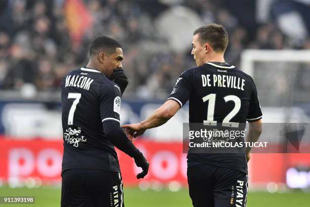 Bordeaux's French forward Nicolas De Preville celebrates with Bordeaux's Brazilian forward Malcom after scoring a goal during the French Ligue 1...