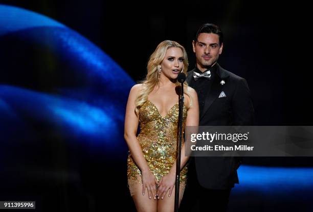 Adult film actress Mia Malkova and adult film actor Ryan Driller present an award during the 2018 Adult Video News Awards at The Joint inside the...