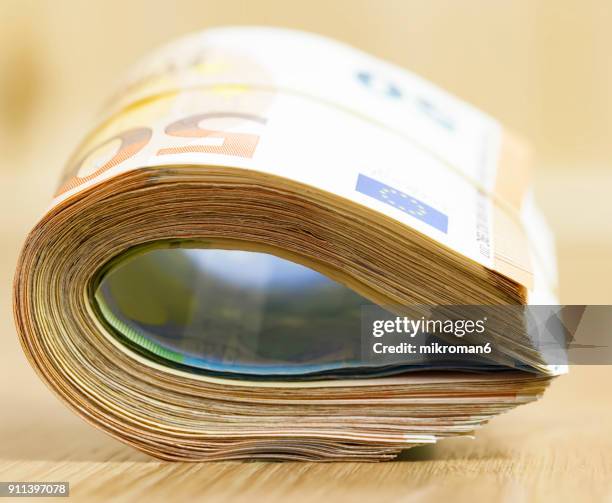 Roled Note Rolled Bank Notes Photos and Premium High Res Pictures - Getty Images