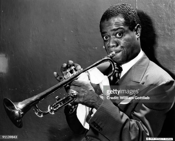 Photo of Louis ARMSTRONG; Posed portrait of Louis Armstrong, trumpet