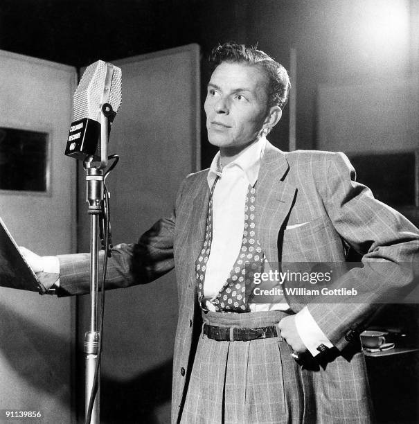 Photo of Frank SINATRA; posed, next to microphone, recording at Columbia Recording studios, Liederkrantz Hall