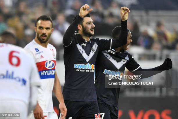 Bordeaux's French forward Gaetan Laborde celebrates after scoring a goal from a penalty during the French Ligue 1 football match between Bordeaux and...