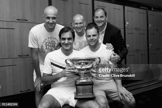 Front Row Roger Federer of Switzerland, Severin Luthi,coach Back Row L-R Ivan Ljubicic, coach,Daniel Troxler, physio and Tony Godsick,agent pose with...