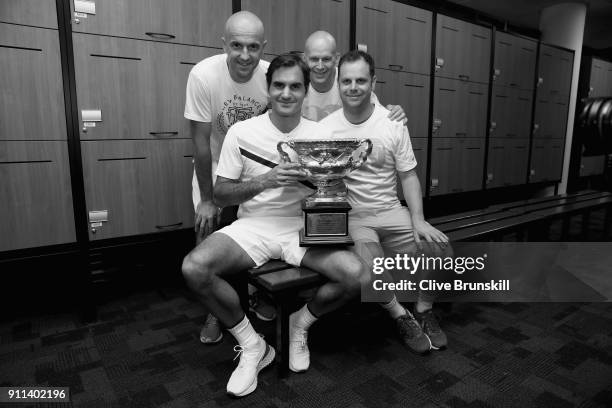 Front Row Roger Federer of Switzerland, Severin Luthi,coach Back Row L-R Ivan Ljubicic, coach,Daniel Troxler, physio and Tony Godsick,agent pose with...