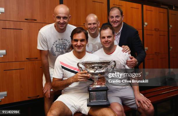 Front Row Roger Federer of Switzerland, Severin Luthi,coach Back Row L-R Ivan Ljubicic, coach,Daniel Troxler, physio and Tony Godsick,agent pose with...