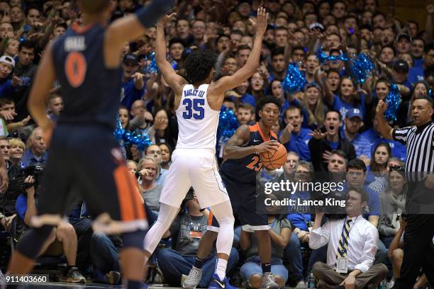 Nigel Johnson of the Virginia Cavaliers looks to inbounds the ball against Marvin Bagley III of the Duke Blue Devils at Cameron Indoor Stadium on...