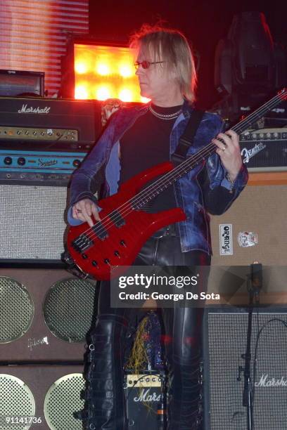 Photo of AEROSMITH, Tom Hamilton from Aerosmith performs in concert at Madison Square Garden 11/16/03 in New Yor City