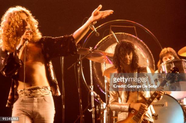 Photo of Jimmy PAGE and Robert PLANT and LED ZEPPELIN, L-R: Robert Plant, Jimmy Page, John Bonham performing live onstage
