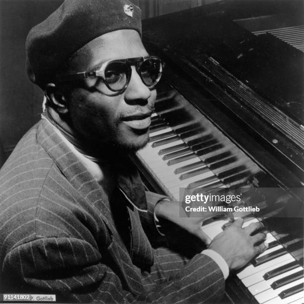 Photo of Thelonious MONK; Posed at the Piano in Minton's Playhouse, Harlem