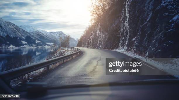 pov car driving in norway: along the fjords - freedom to the camera stock pictures, royalty-free photos & images