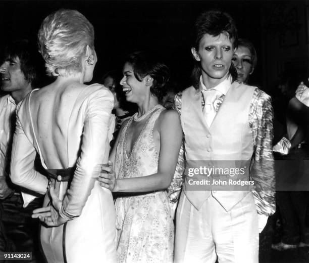 Photo of Bianca JAGGER and Angie BOWIE and David BOWIE, with wife Angie Bowie & Bianca Jagger