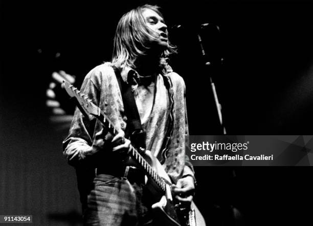 Photo of Kurt COBAIN and NIRVANA; Kurt Cobain performing live onstage at Palasport, Modena