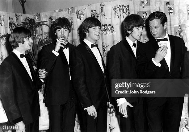 Photo of Brian EPSTEIN and BEATLES; Ringo Starr, Paul McCartney, John Lennon, George Harrison & Brian Epstein - posed, group shot - at the Premier of...