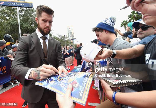 Mike Green of the Detroit Red Wings walks the red carpet prior to playing in the 2018 Honda NHL All-Star Game at Amalie Arena on January 28, 2018 in...