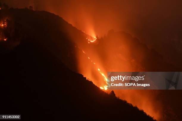 Flames and smoke rise from the Zabarwan mountains in Srinagar, Indian administered Kashmir. A major fire engulfed in the Zabarwan range at Brein...