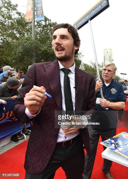 Connor Hellebuyck of the Winnipeg Jets walks the red carpet prior to playing in the 2018 Honda NHL All-Star Game at Amalie Arena on January 28, 2018...