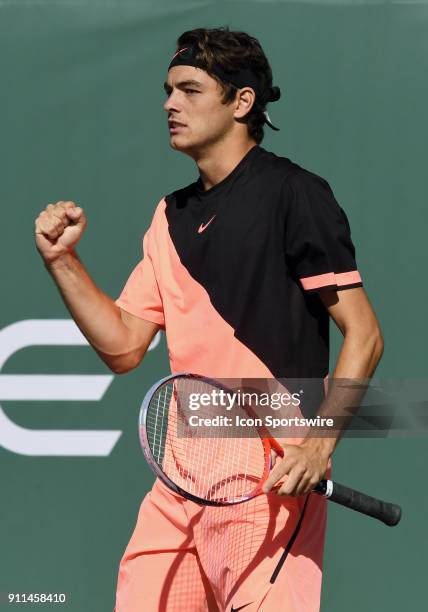 Taylor Fritz reacts after winning a point in the second set of a match against Bradley Klahn during the finals of the Oracle Challenger Series...