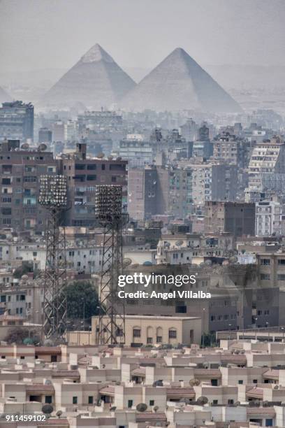 cairo. pyramids - pyramid shapes around the house stock pictures, royalty-free photos & images