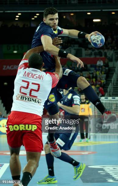 Nedim Remili of France in action against Mads Mensah Larsen of Denmark during the 2018 EHF European Men's Handball Championship third place match...