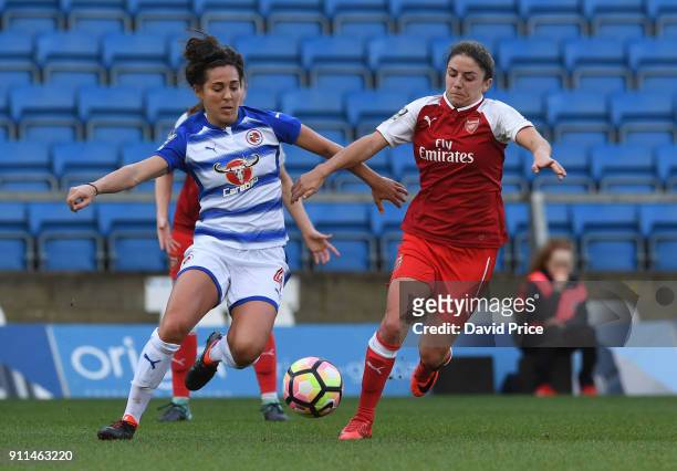 Danielle van de Donk of Arsenal challenges Fara Williams of Reading during the match between Reading FC Women and Arsenal Women at Adams Park on...