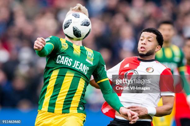 Lex Immers of ADO Den Haag, Tonny Vilhena of Feyenoord during the Dutch Eredivisie match between Feyenoord Rotterdam and ADO Den Haag at the Kuip on...