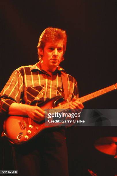Photo of Tim RENWICK and Eric CLAPTON, Tim Renwick performing live onstage with Eric Clapton