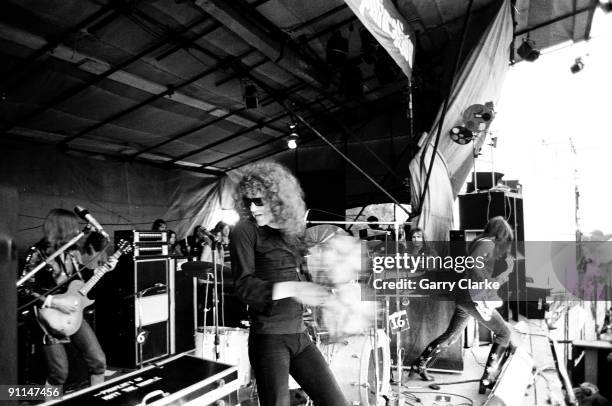 Photo of MOTT THE HOOPLE and Ian HUNTER and Mick RALPHS and Pete Overend WATTS, L-R: Mick Ralphs, Ian Hunter, Pete Overend Watts performing live...