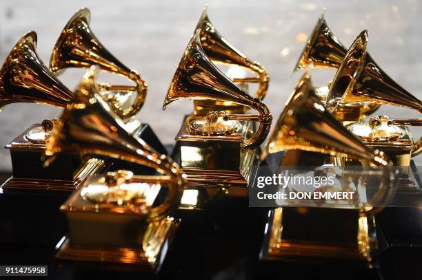 Grammy trophies sit in the press room during the 60th Annual Grammy Awards on January 28 in New York. / AFP PHOTO / Don EMMERT