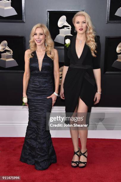 Kimberly Woolen and singer Ashley Campbell, wife and daughter of GRAMMY nominee Glen Campbell attend the 60th Annual GRAMMY Awards at Madison Square...
