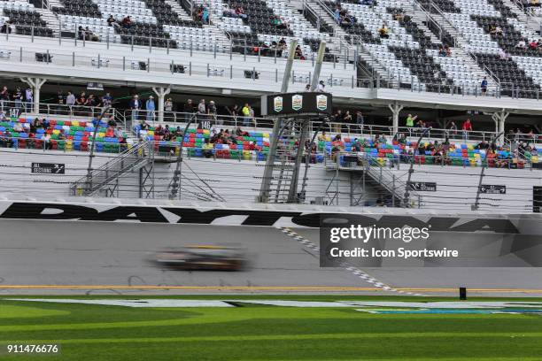 The Mustang Sampling Racing Cadillac DPi-V.R. Of Filipe Albuquerque, Joao Barbosa and Christian Fittipaldi races during the Rolex 24 at Daytona on...