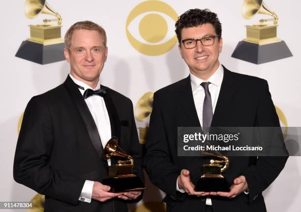 Engineers John Hanes and Serban Ghenea pose with the award for Best Engineered Album, Non-Classical in the press room during the 60th Annual GRAMMY...