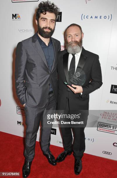 Alec Secareanu and Francis Lee, winner of The Philip French Award for Breakthrough Filmmaker for "God's Own Country", attend the London Film Critics'...