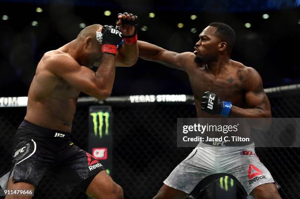 Derek Brunson punches Ronaldo "Jacare" Souza of Brazil in their middleweight bout during the UFC Fight Night event inside the Spectrum Center on...