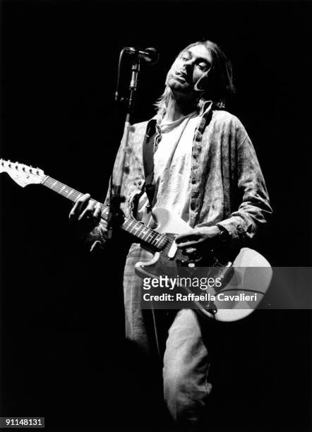 Photo of Kurt COBAIN and NIRVANA; Kurt Cobain performing live onstage at Palasport, Modena, playing Fender Mustang guitar