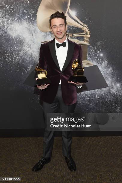 Film composer Justin Hurwitz, winner of Best Compilation Soundtrack for Visual Media for 'La La Land', poses backstage at the Premiere Ceremony...