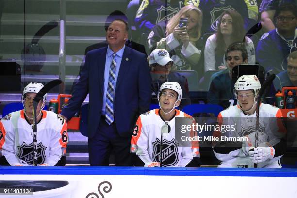 Rickard Rakell of the Anaheim Ducks, Head Coach Gerard Gallant of the Vegas Golden Knights, Johnny Gaudreau of the Calgary Flames, and Brock Boeser...