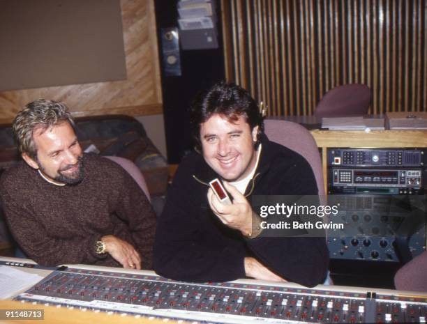 Photo of Tony BROWN and Vince GILL, w/producer Tony Brown