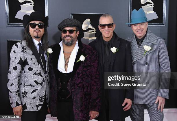 Recording artists Eddie Perez, Raul Malo, Paul Deakin, and Jerry Dale McFadden of music group The Mavericks attend the 60th Annual GRAMMY Awards at...