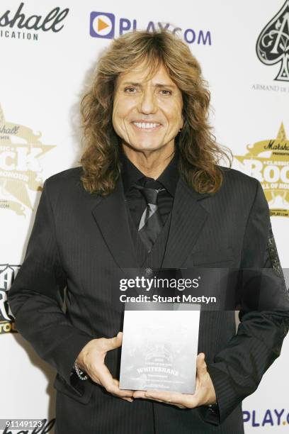 Photo of David COVERDALE and WHITESNAKE, Portrait of David Coverdale with the Album of the Year Award at the Classic Rock Roll of Honour Awards