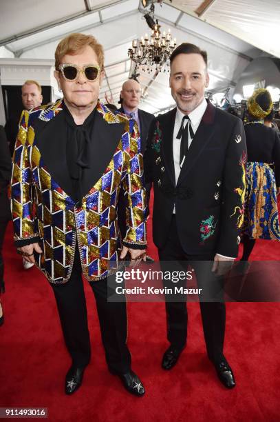 Recording artist Elton John and David Furnish attend the 60th Annual GRAMMY Awards at Madison Square Garden on January 28, 2018 in New York City.