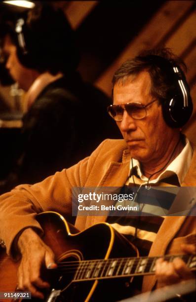 Photo of Chet ATKINS, Chet Atkins performing in recording studio