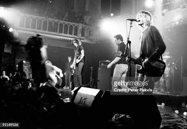 25th NOVEMBER: bassist Krist Novoselic and guitarist Kurt Cobain from American rock band Nirvana perform live on stage at Paradiso in Amsterdam,...