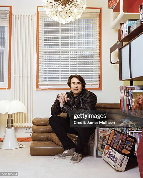 Tv & radio presenter Jonathan Ross poses for a portrait shoot for the Guardian Weekend magazine in London on March 3, 2009.