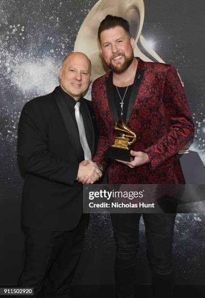 Chair of the Board for The Recording Academy John Poppo and Recording artist Zach Williams, winner of Best Contemporary Christian Music Album for...
