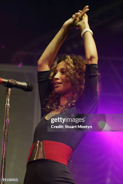 Photo of SUGABABES and Amelle BERRABAH, Amelle Berrabah performing live onstage in the Big Top