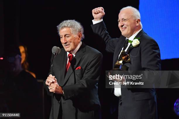 Recording artist Tony Bennett and audio engineer Dae Bennett accept the award for Best Traditional Pop Vocal Album the premiere ceremony during the...