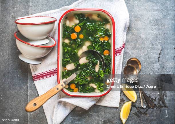 lima bean, kale and parmesan broth - kale stock pictures, royalty-free photos & images