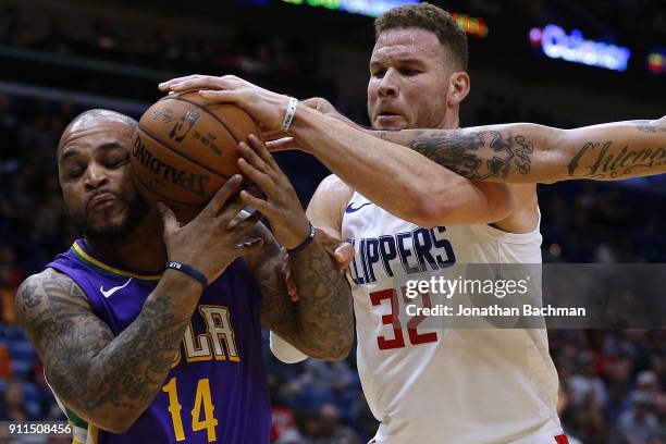 Jameer Nelson of the New Orleans Pelicans and Blake Griffin of the LA Clippers go for a rebound during the second half at the Smoothie King Center on...